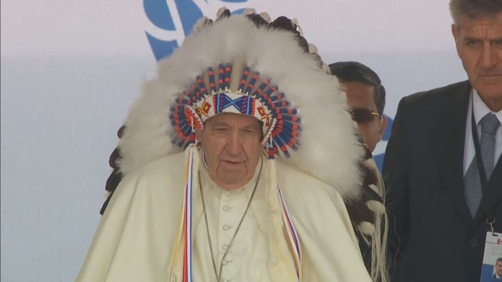 papal apology pope francis wears headdress