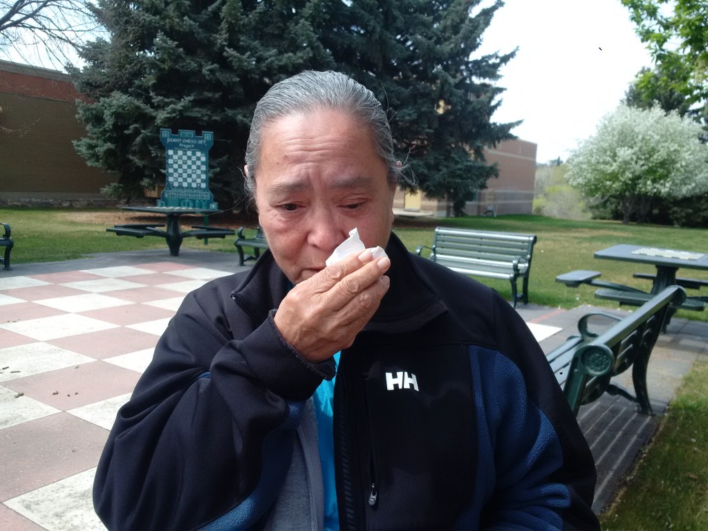 Marion St. Dennis, Connie Oakes' biological mother, wipes away tears after hearing Thursday. APTN/Photo