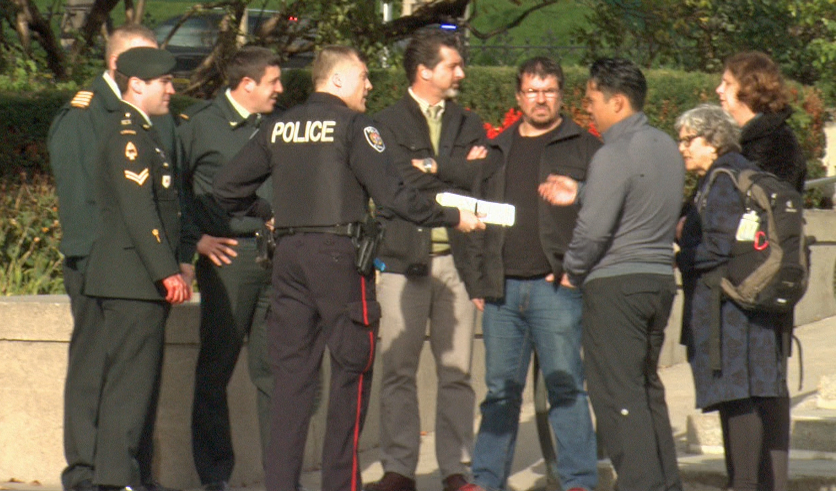 Police interview witnesses following shooting at the War Memorial.