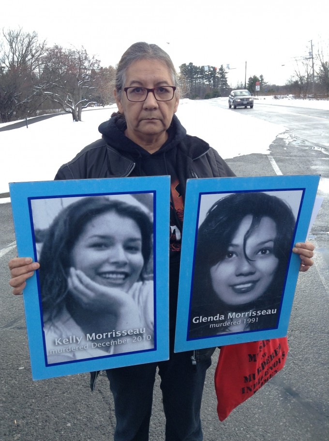 Bridget Tolley holds the pictures of Kelly Morrisseau, left, murdered in Gatineau Dec. 10, 2006 and Kelly's aunt Glenda Morrisseau, murdered in Winnipeg in July 1991. Both are unsolved.