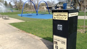 A needle drop box next to a children's playground in London, Ontario's Ivey Park. Kenneth Jackson/APTN photo